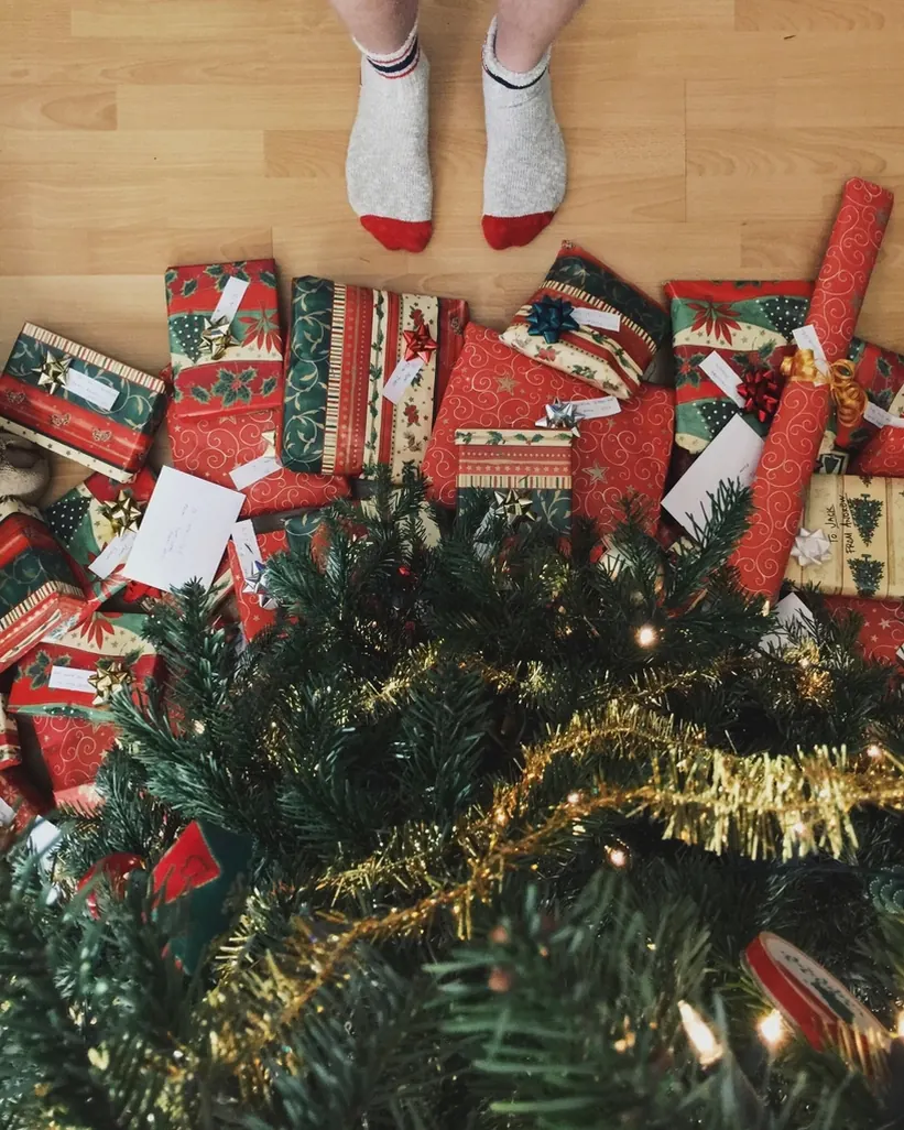 Wrapped Christmas presents on the floor seen from above